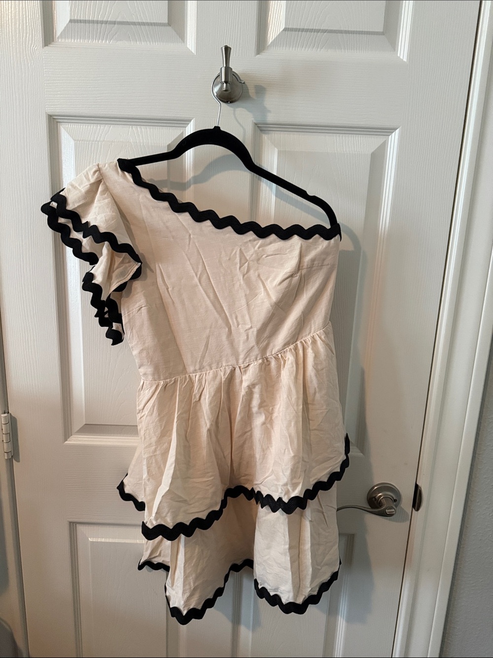 One-Shoulder Cream Ruffle Dress with Black Trim